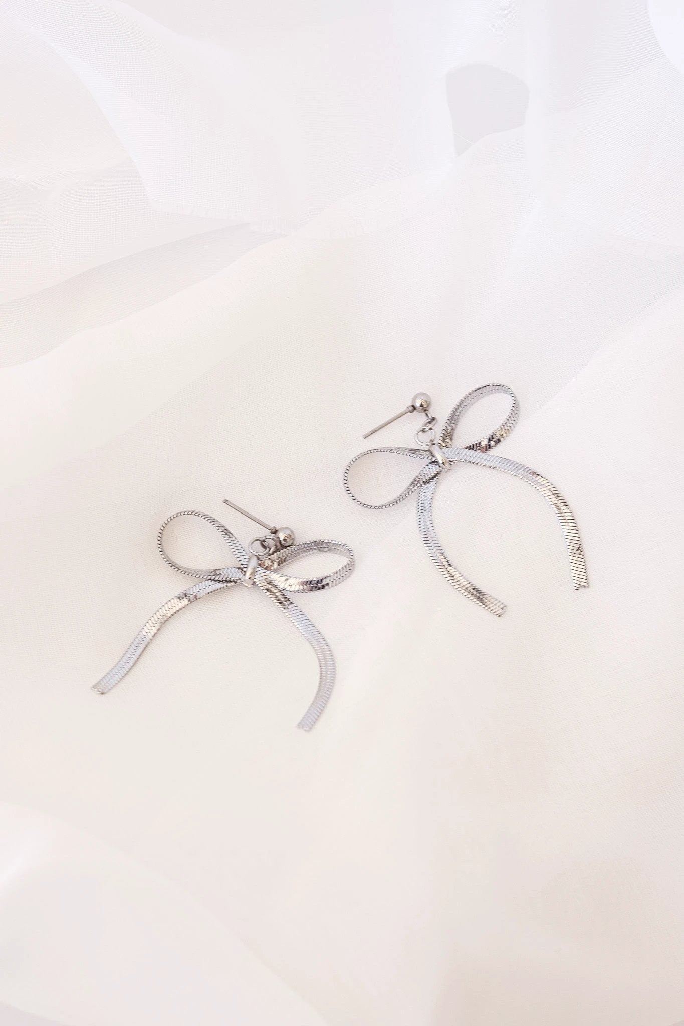 Lauren Bow Dangle by Rose & Clay