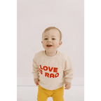 Love is Rad Baby Pullover Sweatshirt by Polished Prints
