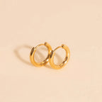 Mini Rounded Huggie Hoop Earrings by Oh Clementine