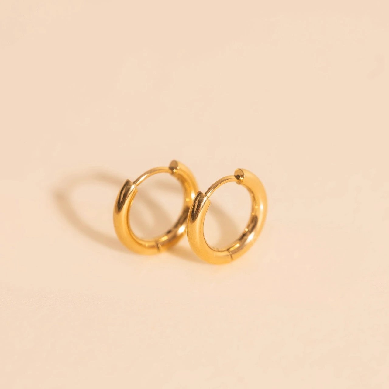 Mini Rounded Huggie Hoop Earrings by Oh Clementine