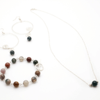 Odalin sterling silver statement earrings with green jade by Alegria Accessories Inc