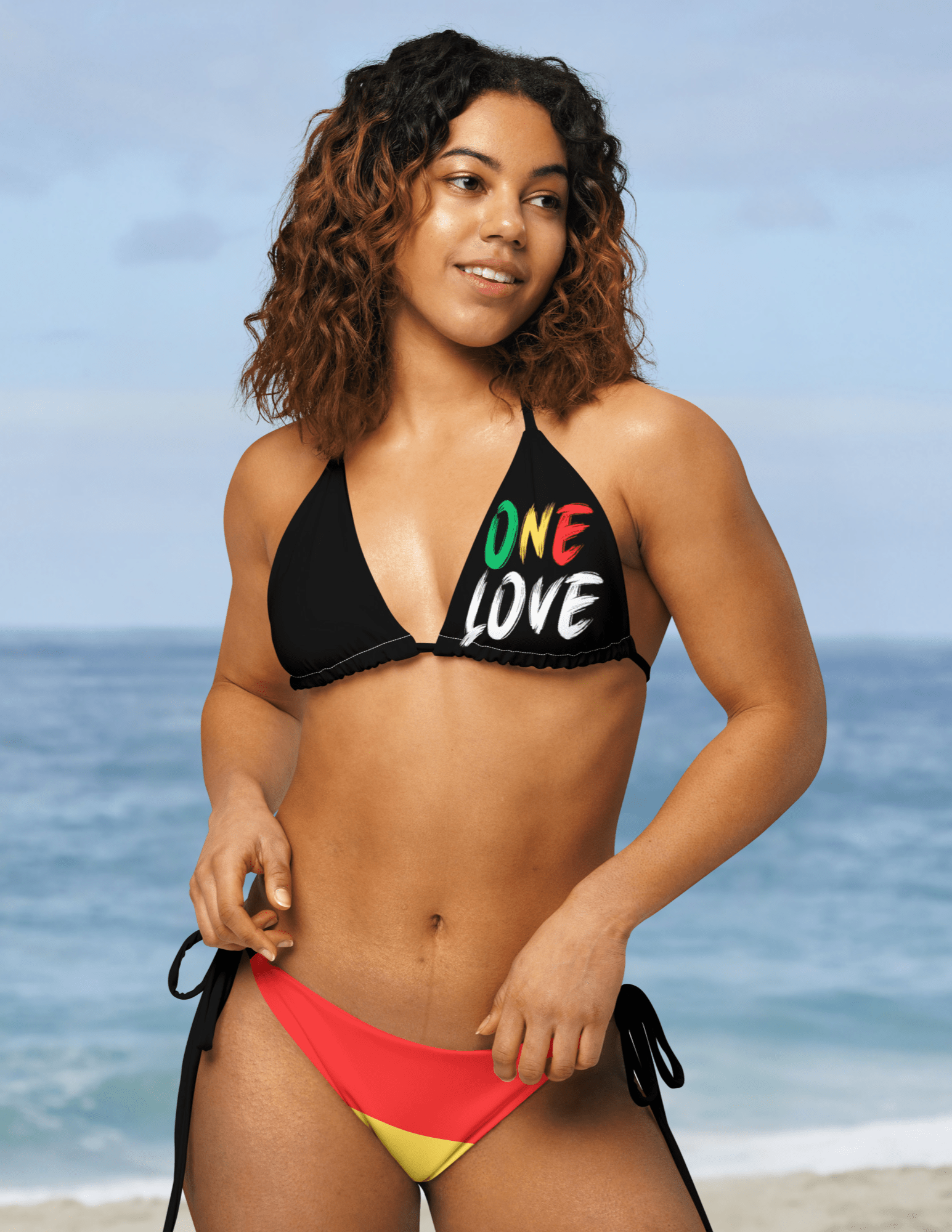 One Love Reggae All Over Print Recycled String Bikini All - Over Print Recycled String Bikini La Vie Bien One Love Reggae All Over Print Recycled String Bikini