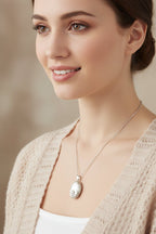 Oval Claddagh Locket Necklace in Sterling Silver Locket La Vie Bien Oval Claddagh Locket Necklace in Sterling Silver
