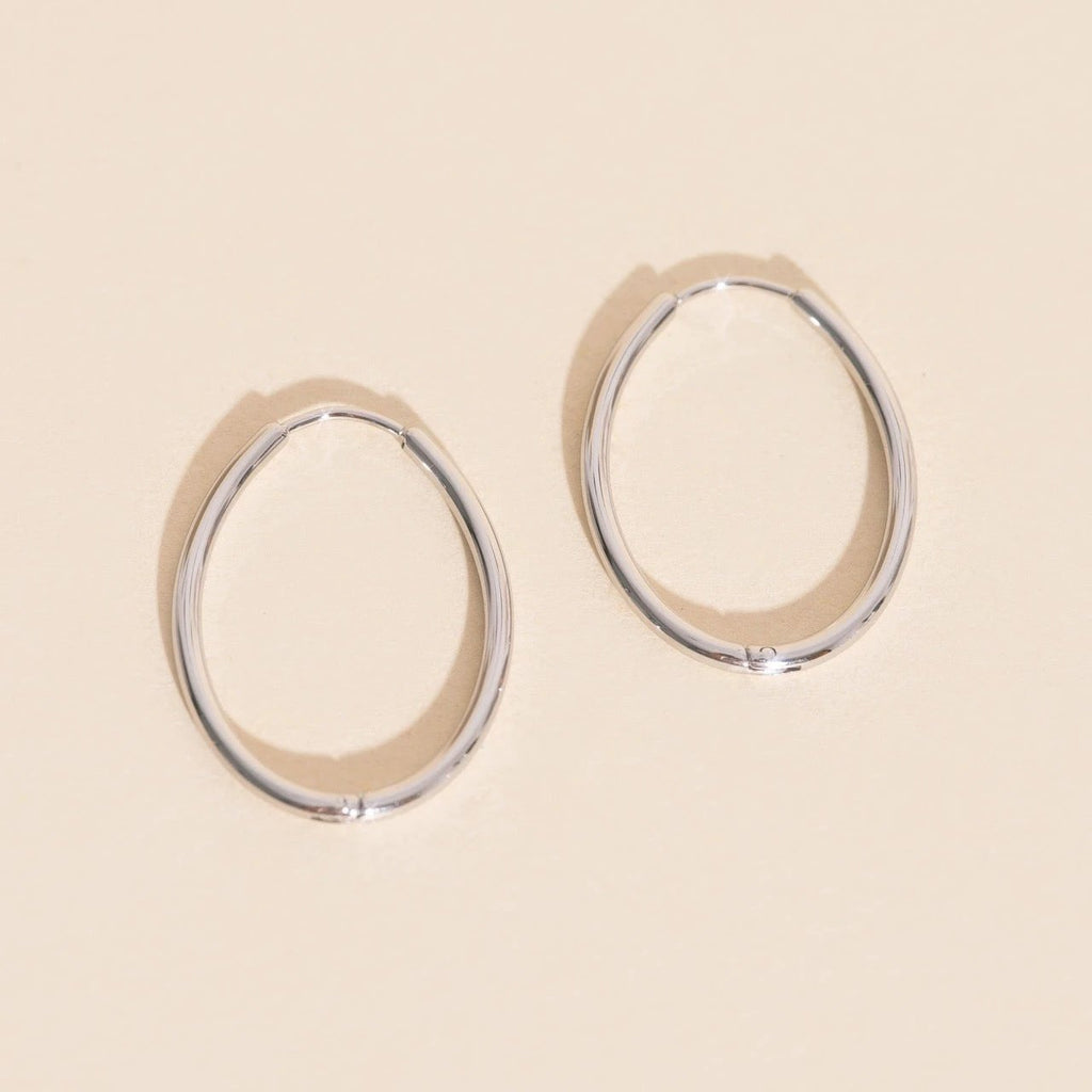 Oval Rounded Huggie Hoop Earrings by Oh Clementine