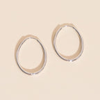Oval Rounded Huggie Hoop Earrings by Oh Clementine