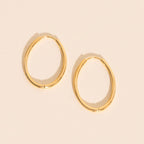 Oval Rounded Huggie Hoop Earrings by Oh Clementine