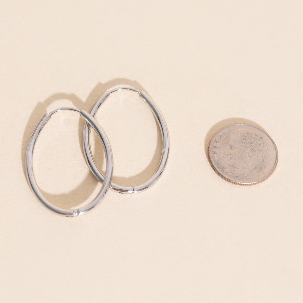 Oval Rounded Huggie Hoop Earrings by Oh Clementine