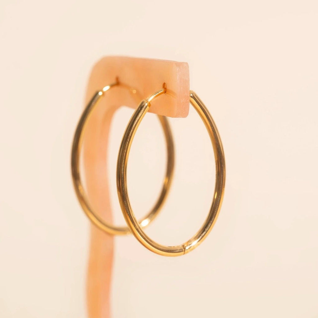 Oval Rounded Huggie Hoop Earrings by Oh Clementine