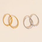 Oval Rounded Huggie Hoop Earrings by Oh Clementine
