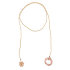 Peach Blossom peach and cream beaded Y necklace with crystal and gold flower detail by Alegria Accessories Inc