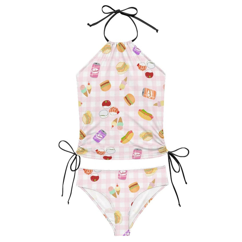 Two-piece swimsuit with food-themed print on a white background