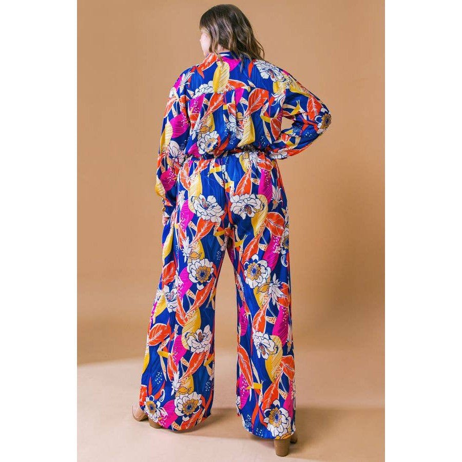 Plus Size Printed Woven Jumpsuit in Blue with Flowers And Leaf Designs | Long Sleeve Romper [Sizes 1X - 3X]
