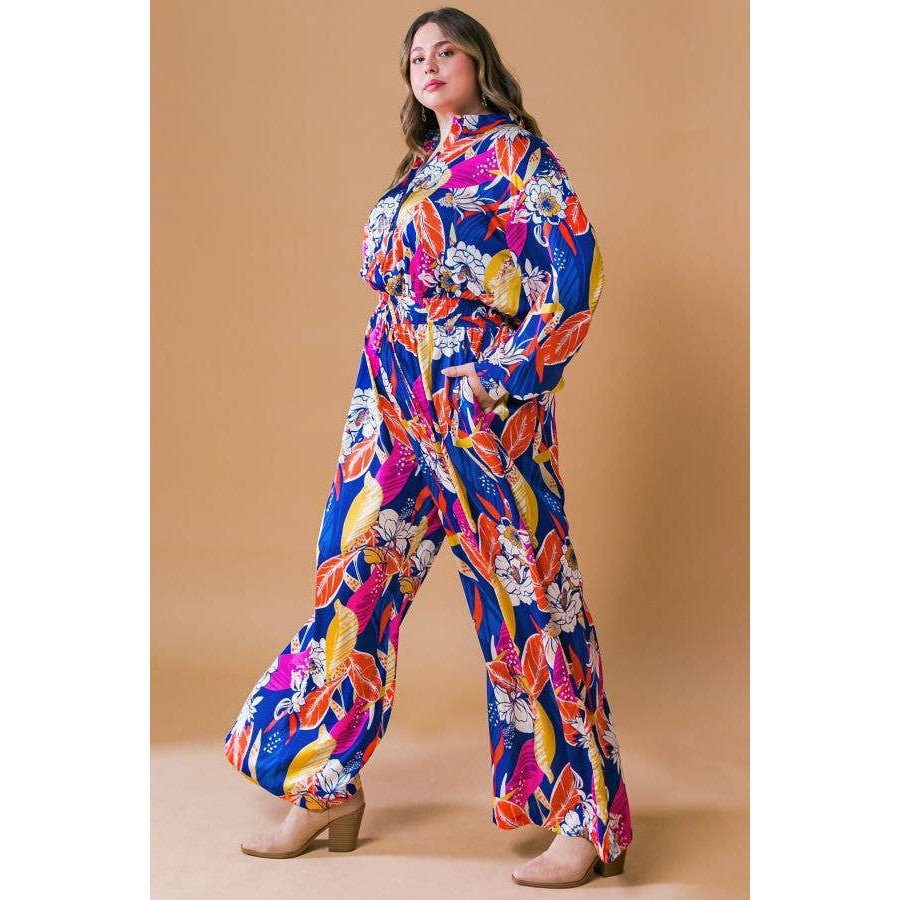 Plus Size Printed Woven Jumpsuit in Blue with Flowers And Leaf Designs | Long Sleeve Romper [Sizes 1X - 3X]