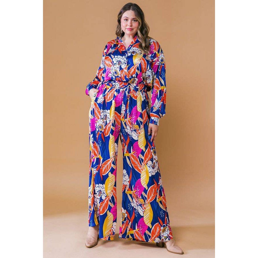 Plus Size Printed Woven Jumpsuit in Blue with Flowers And Leaf Designs | Long Sleeve Romper [Sizes 1X - 3X]