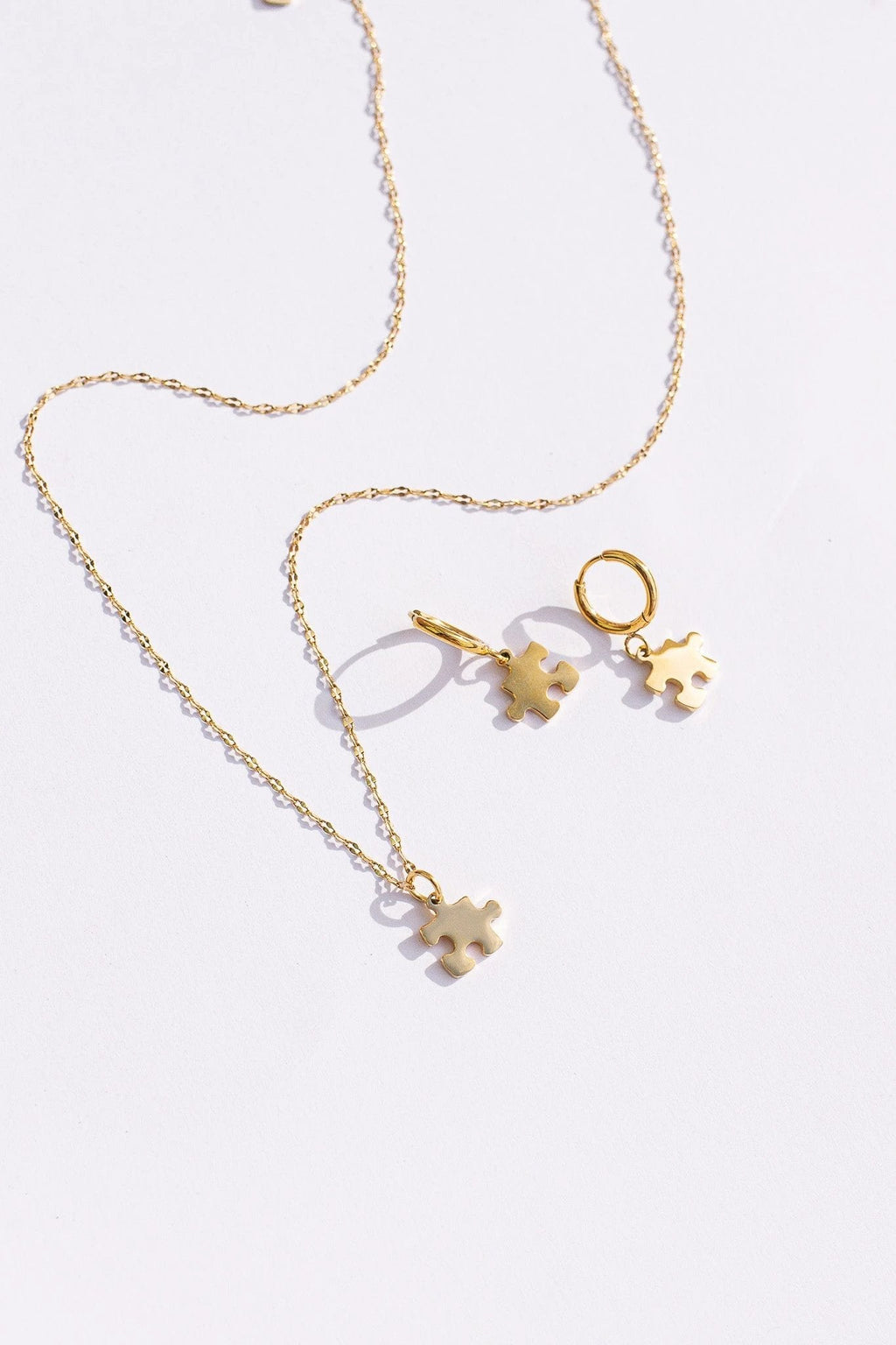 Puzzle Piece Necklace by Rose & Clay