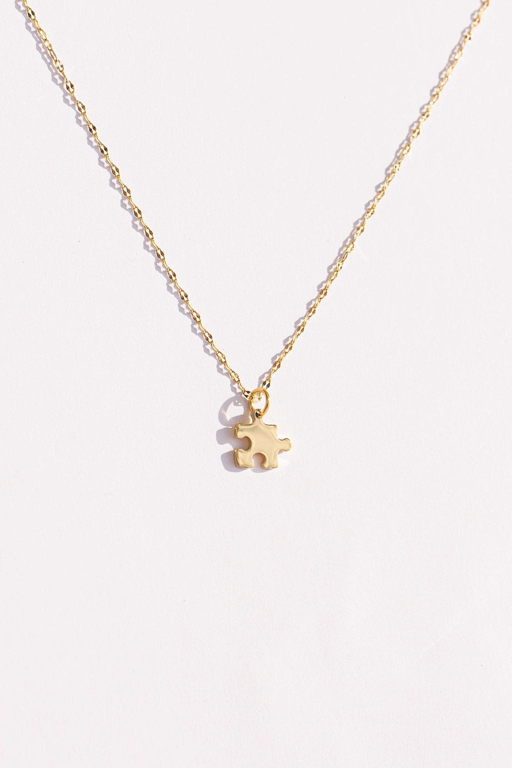 Puzzle Piece Necklace by Rose & Clay
