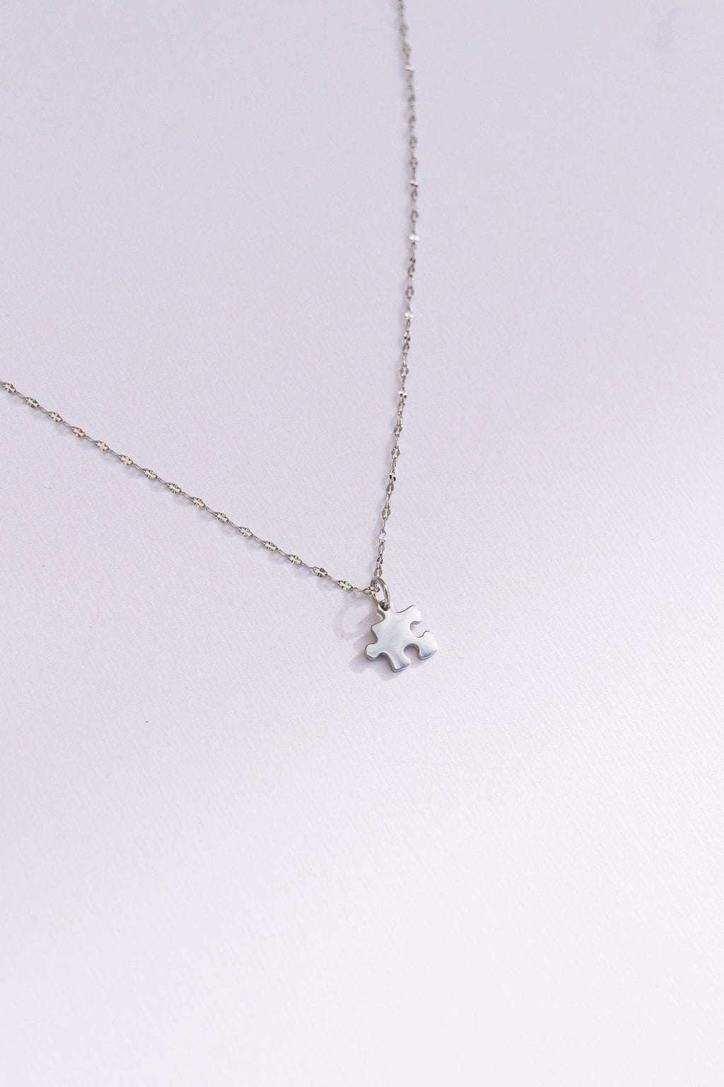 Puzzle Piece Necklace by Rose & Clay