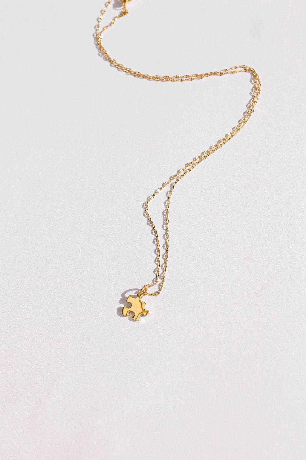 Puzzle Piece Necklace by Rose & Clay