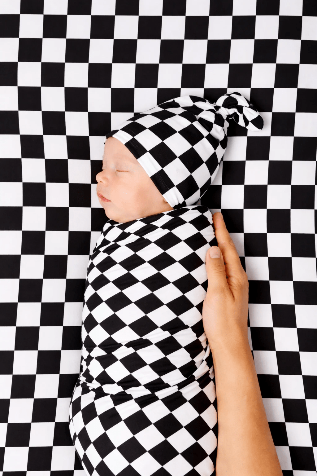 Race Black & White Checkered Stretch Swaddle by Little Mae & Co
