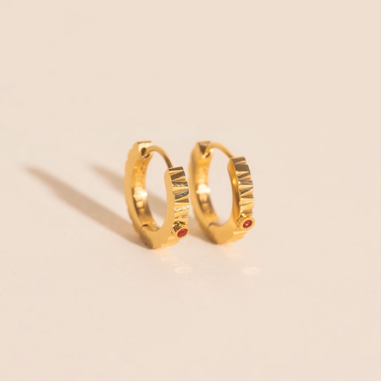 Red Crystal Textured Huggie Hoop Earrings by Oh Clementine