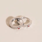Red Crystal Textured Huggie Hoop Earrings by Oh Clementine