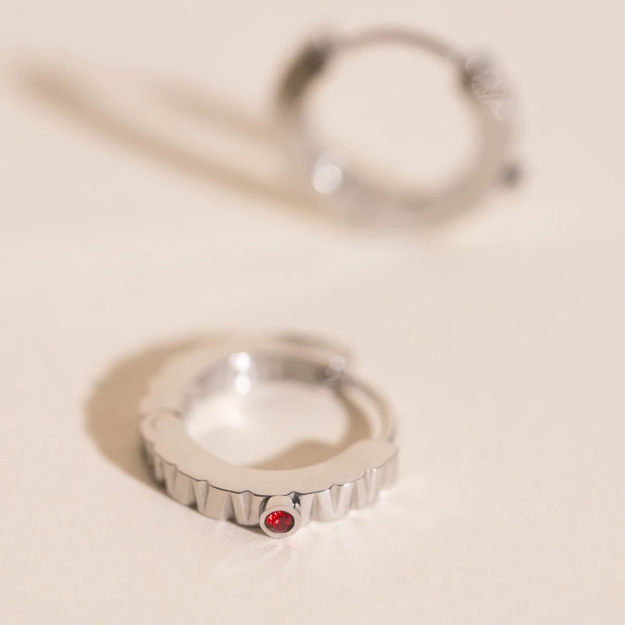 Red Crystal Textured Huggie Hoop Earrings by Oh Clementine