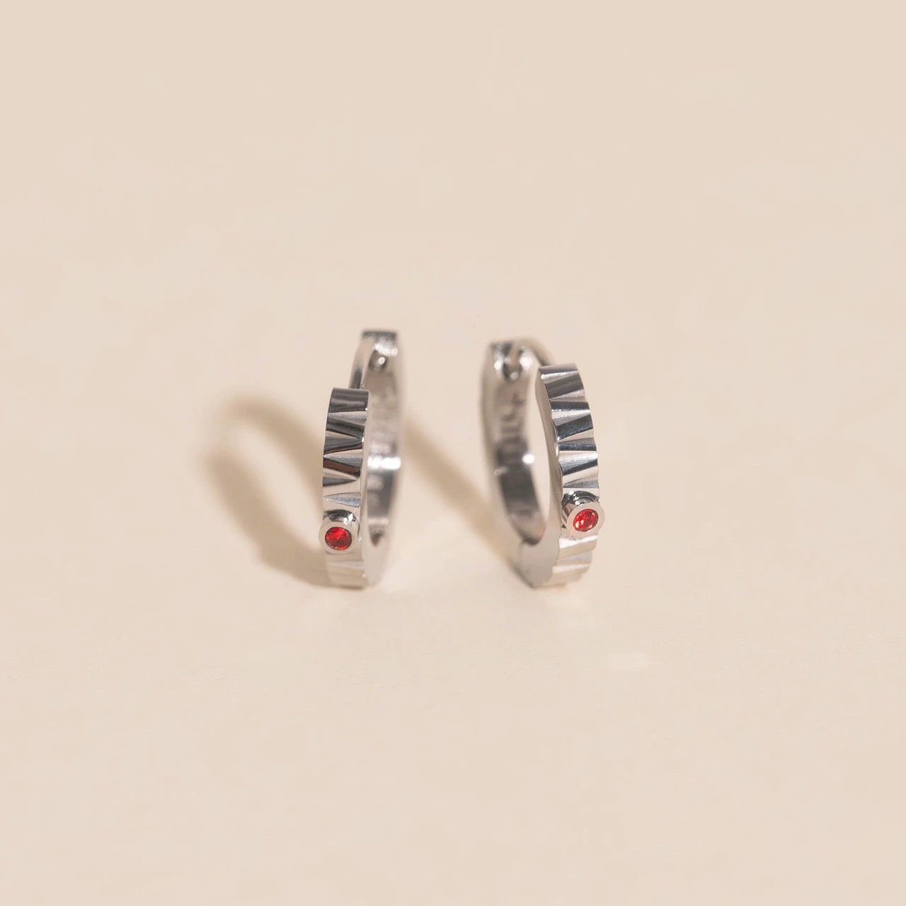 Red Crystal Textured Huggie Hoop Earrings by Oh Clementine
