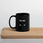 The Void Black Cat Glossy Mug by La Vie Bien