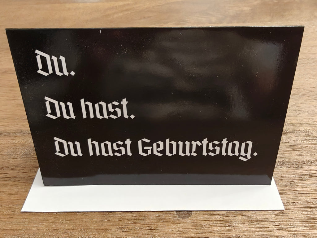Du hast Geburtstag funny dry humor German birthday Greeting card, blank inside with envelope