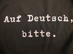 Auf Deutsch, bitte. German Language Tee Shirt, typewriter font Gildan 5000