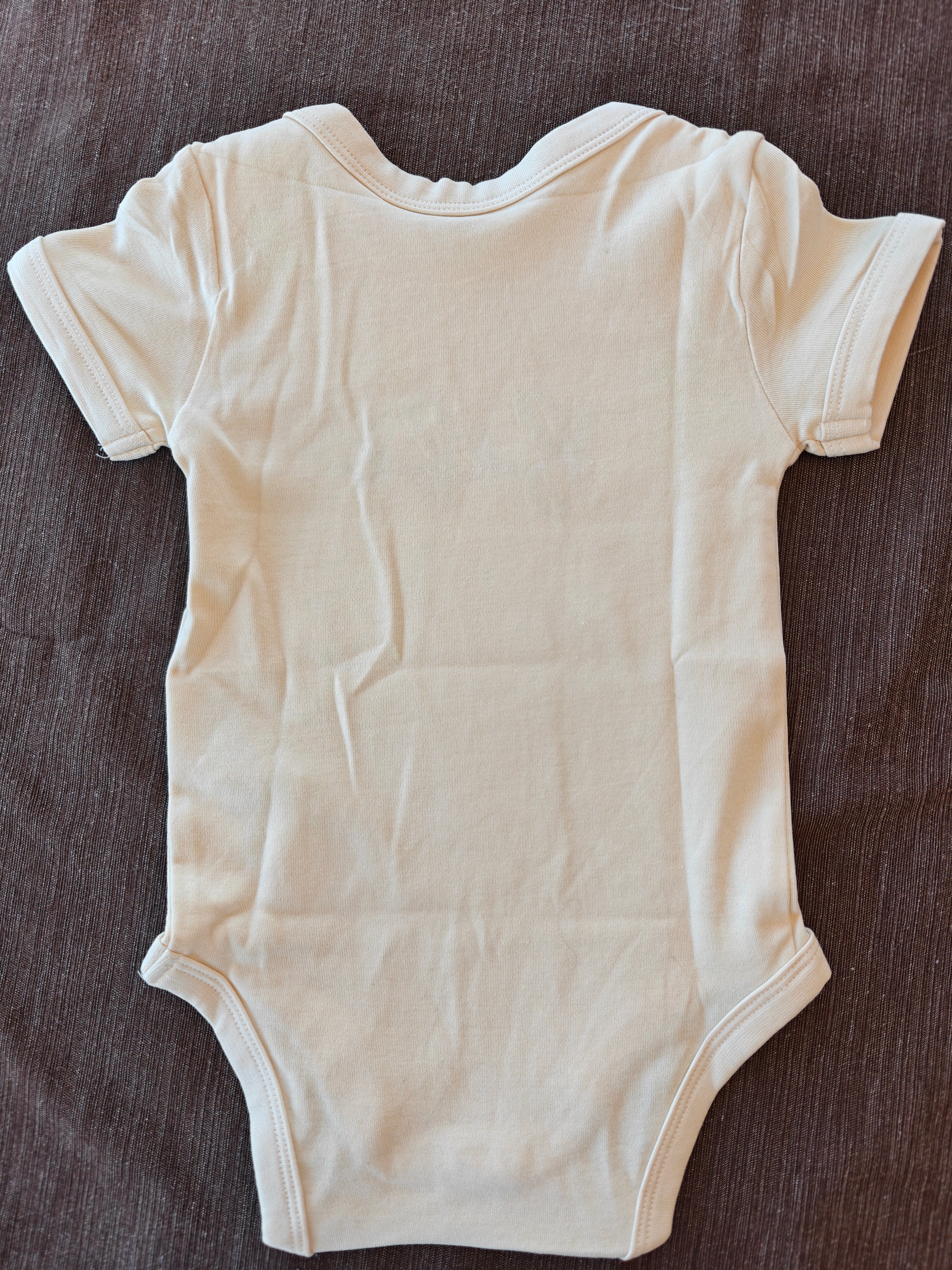 Bébé French embroidered Organic cotton baby one piece for francophone baby showers