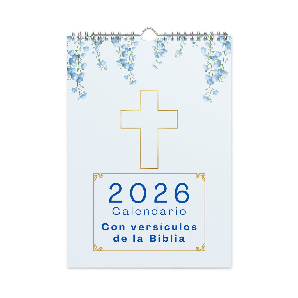 2026 Spanish calendar cover featuring light blue background with watercolor blue flowers at top, gold outlined cross in center, and title text "2026 Calendario Con versículos de la Biblia" in blue lettering within decorative gold frame