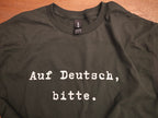 Auf Deutsch, bitte. German Language Tee Shirt, typewriter font Gildan 5000