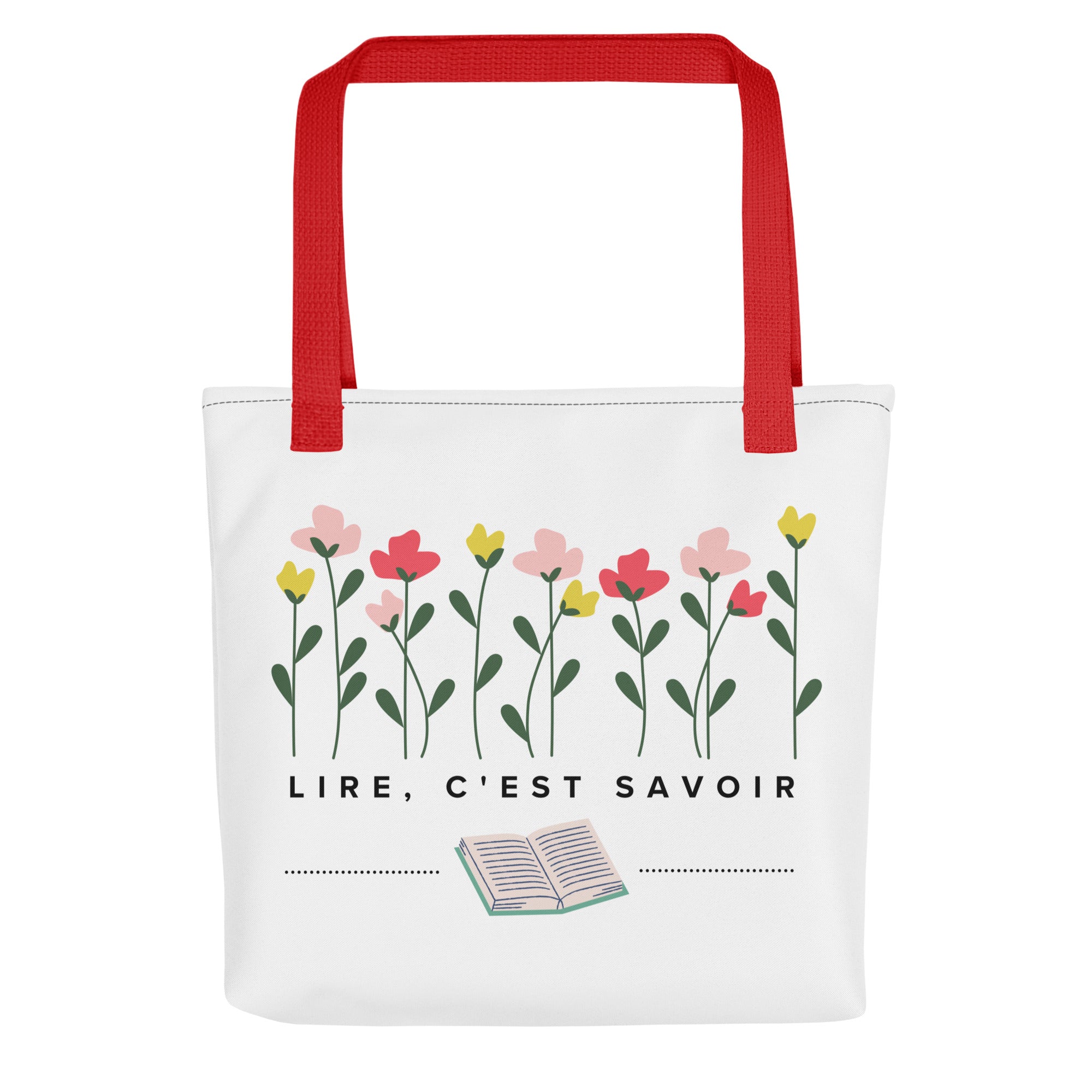 White canvas tote bag with red handles featuring hand-drawn pink, coral, and yellow flowers with green stems at top, French text "LIRE, C'EST SAVOIR" (to read is to know) in center, and small open book illustration at bottom