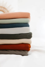 Rust Ribbed Stretch Swaddle by Little Mae & Co