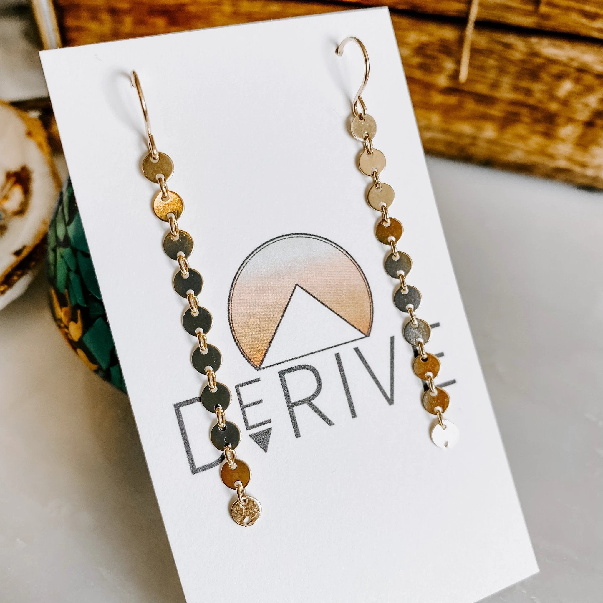 Sand Dollar Earrings by Derive Jewelry