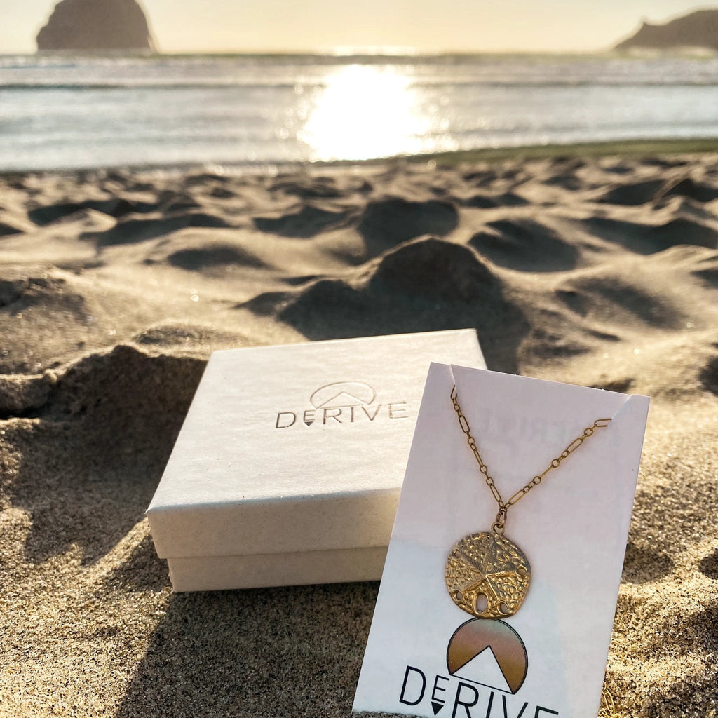 Sand Dollar Pendant Necklace by Derive Jewelry