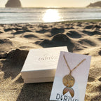 Sand Dollar Pendant Necklace by Derive Jewelry