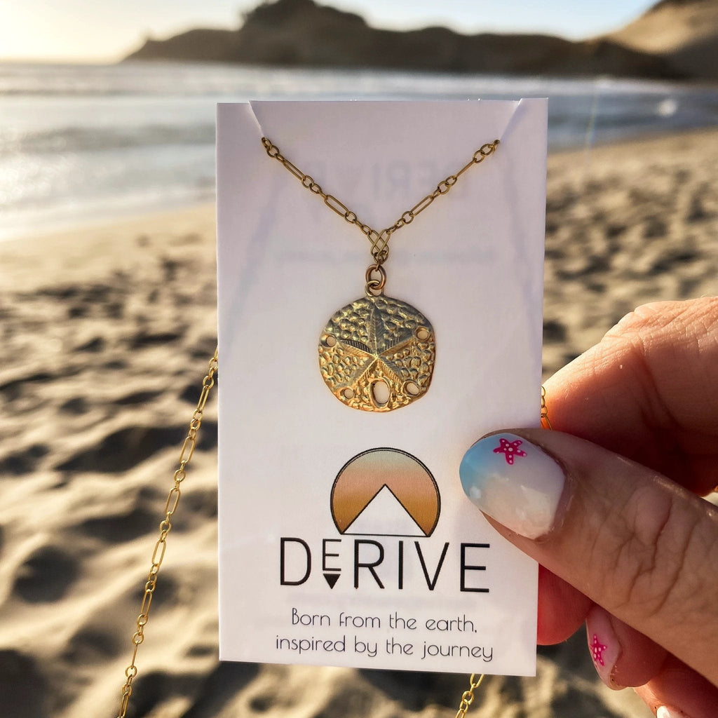 Sand Dollar Pendant Necklace by Derive Jewelry