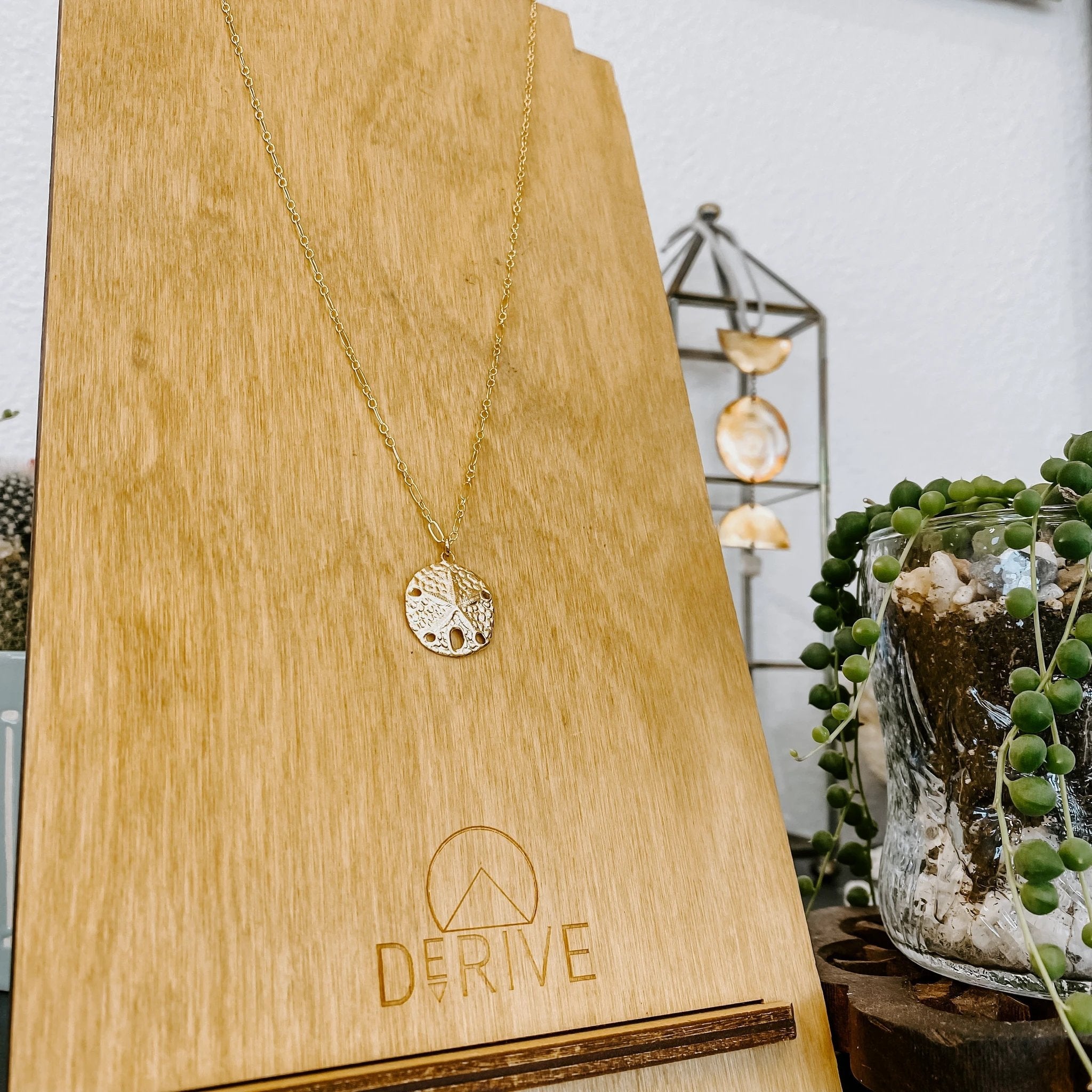 Sand Dollar Pendant Necklace by Derive Jewelry