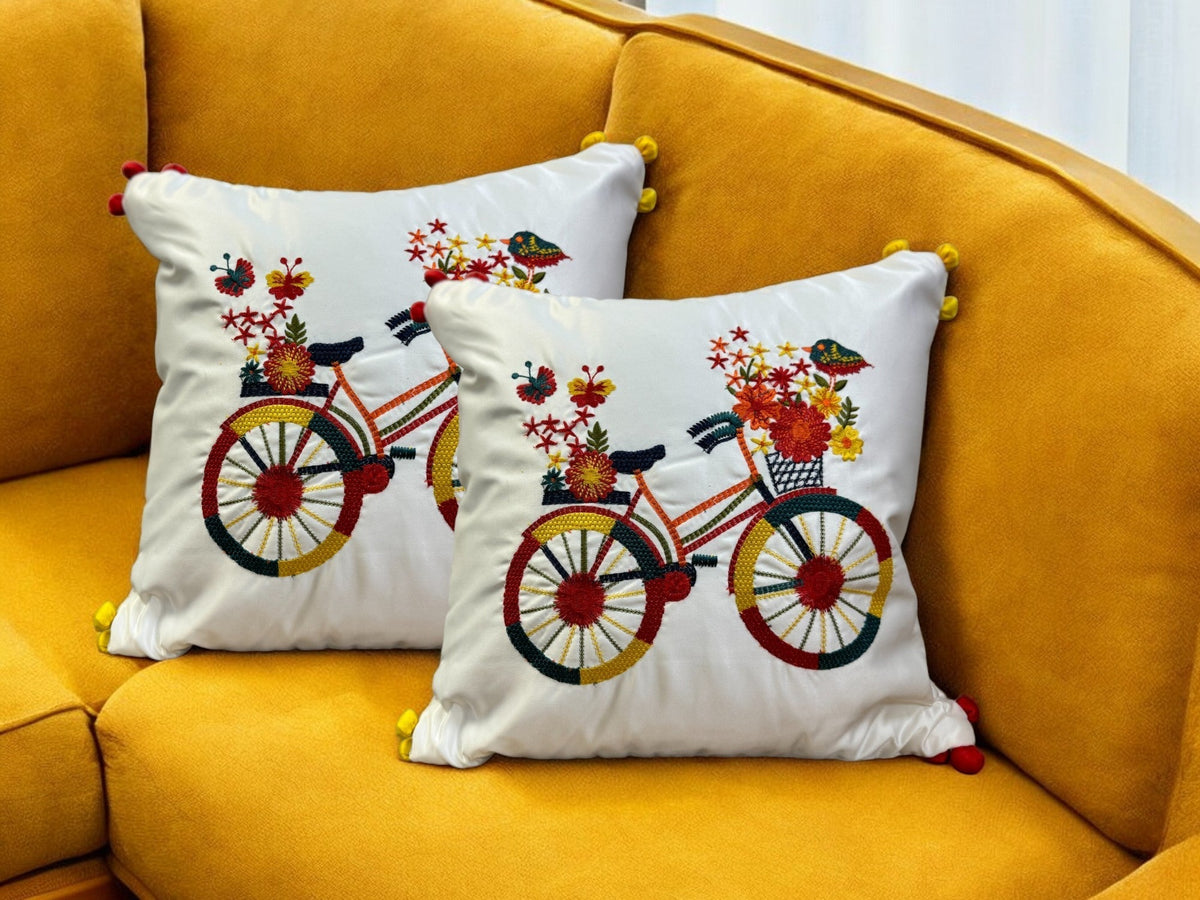 Satin Cushion or Pillow Cover with Cycle Embroidery & Satin Pompom on Sides, Set of 2 Cushion Cover La Vie Bien Satin Cushion or Pillow Cover with Cycle Embroidery & Satin Pompom on Sides, Set of 2