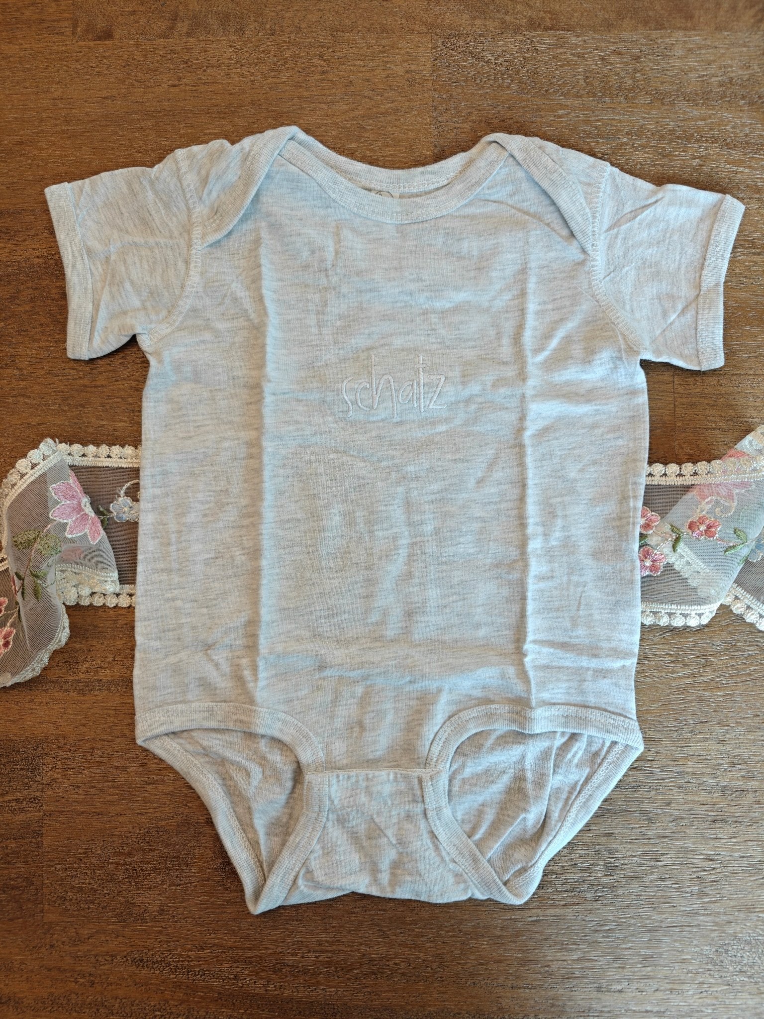 Schatz German "treasure" embroidered Baby jersey bodysuit, newborn gift for German speaking family Baby bodysuit La Vie Bien Schatz German "treasure" embroidered Baby jersey bodysuit, newborn gift for German speaking family