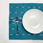 Serpentine Ikat Woven Placemat - Turquoise Siggy La Vie Bien Serpentine Ikat Woven Placemat - Turquoise