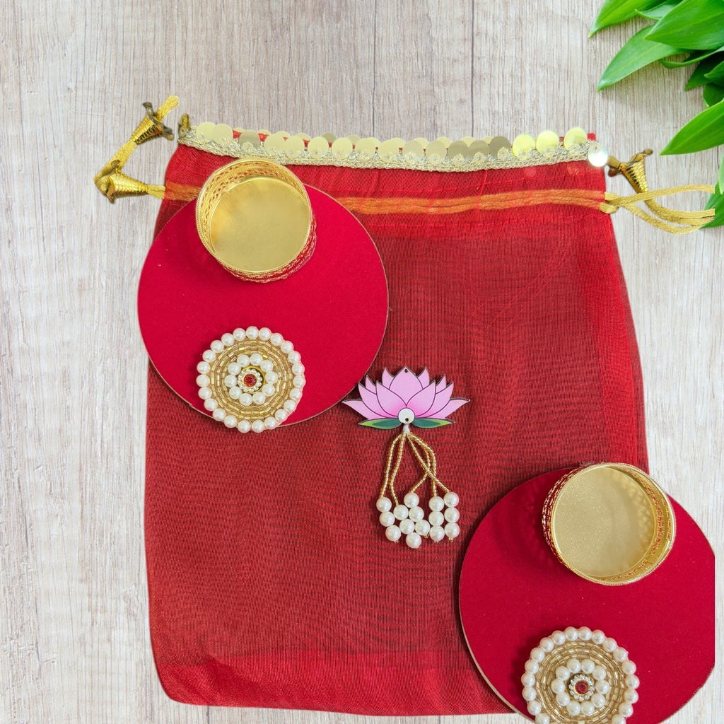 Set of 2 Round Diyas with Pearl Butti in Potli Bag La Vie Bien Set of 2 Round Diyas with Pearl Butti in Potli Bag