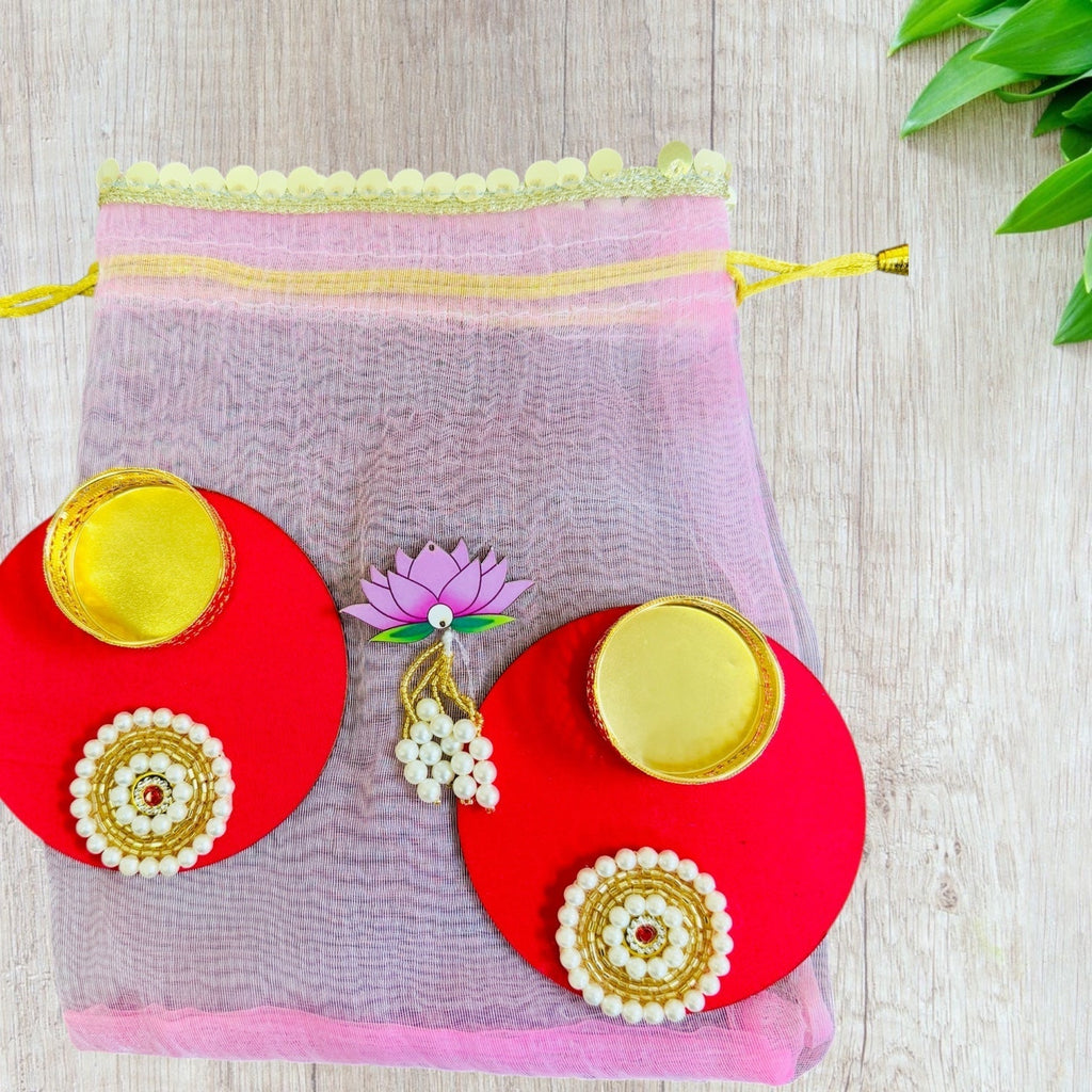 Set of 2 Round Diyas with Pearl Butti in Potli Bag La Vie Bien Set of 2 Round Diyas with Pearl Butti in Potli Bag