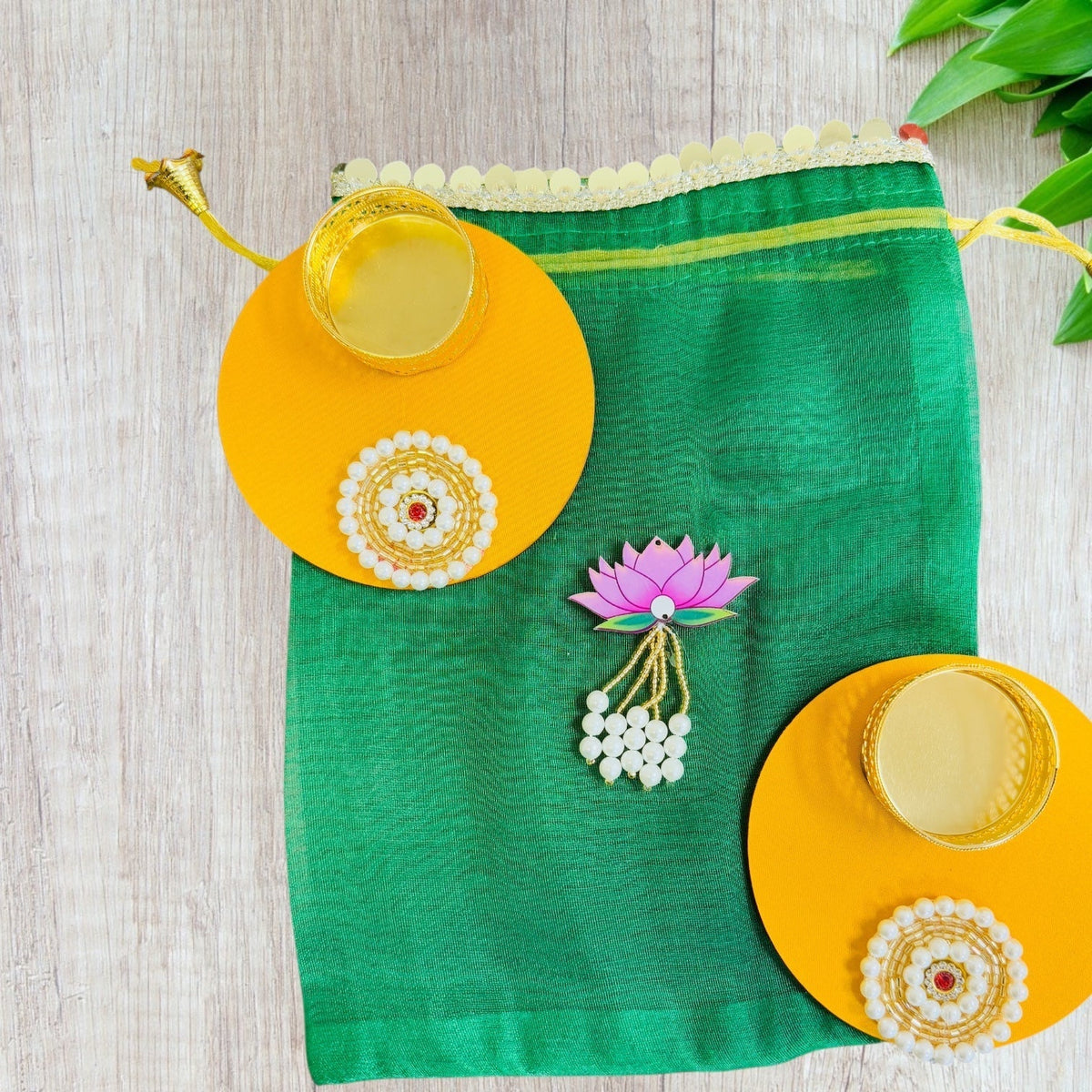 Set of 2 Round Diyas with Pearl Butti in Potli Bag La Vie Bien Set of 2 Round Diyas with Pearl Butti in Potli Bag