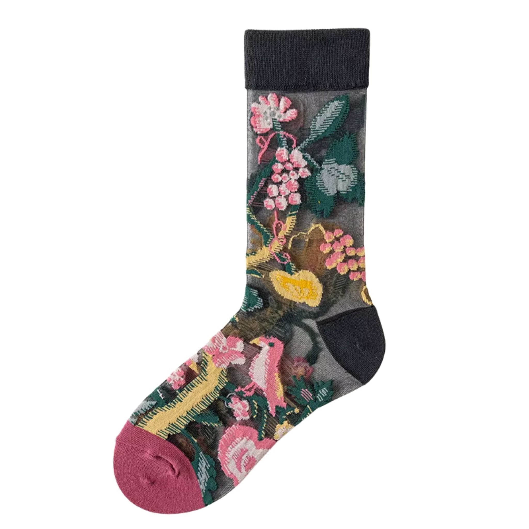 Three pairs of sheer mesh socks featuring different floral patterns - one with sunflowers on a white background, one with red roses and green stems, and one with orange and yellow wildflowers on a light green background, photographed against a white backdrop