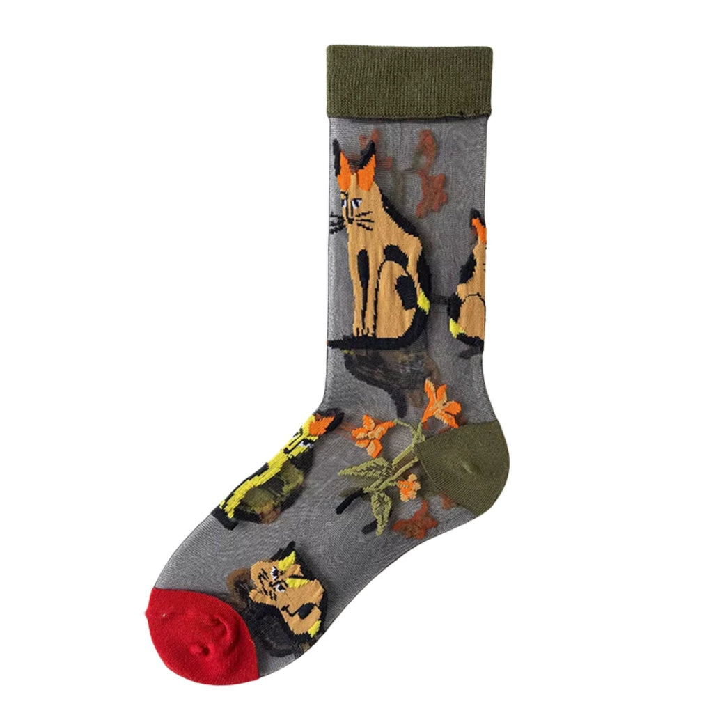 Three pairs of sheer mesh socks featuring different floral patterns - one with sunflowers on a white background, one with red roses and green stems, and one with orange and yellow wildflowers on a light green background, photographed against a white backdrop