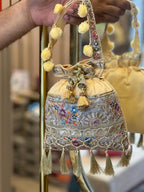 Silk Potli Bag with Hand Embroidery, Pom Pom & Tassels La Vie Bien Silk Potli Bag with Hand Embroidery, Pom Pom & Tassels