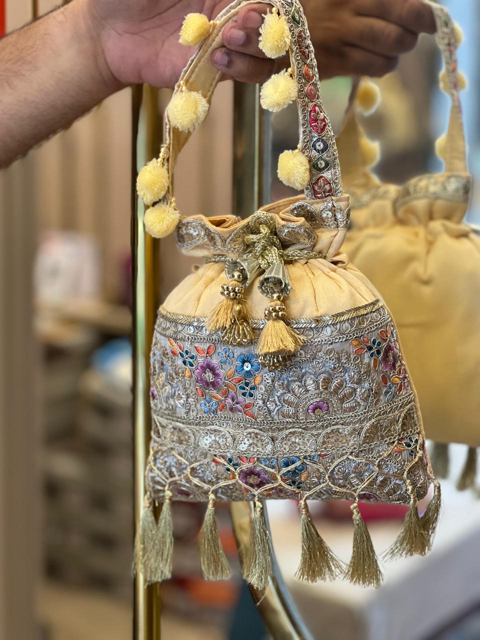 Silk Potli Bag with Hand Embroidery, Pom Pom & Tassels La Vie Bien Silk Potli Bag with Hand Embroidery, Pom Pom & Tassels